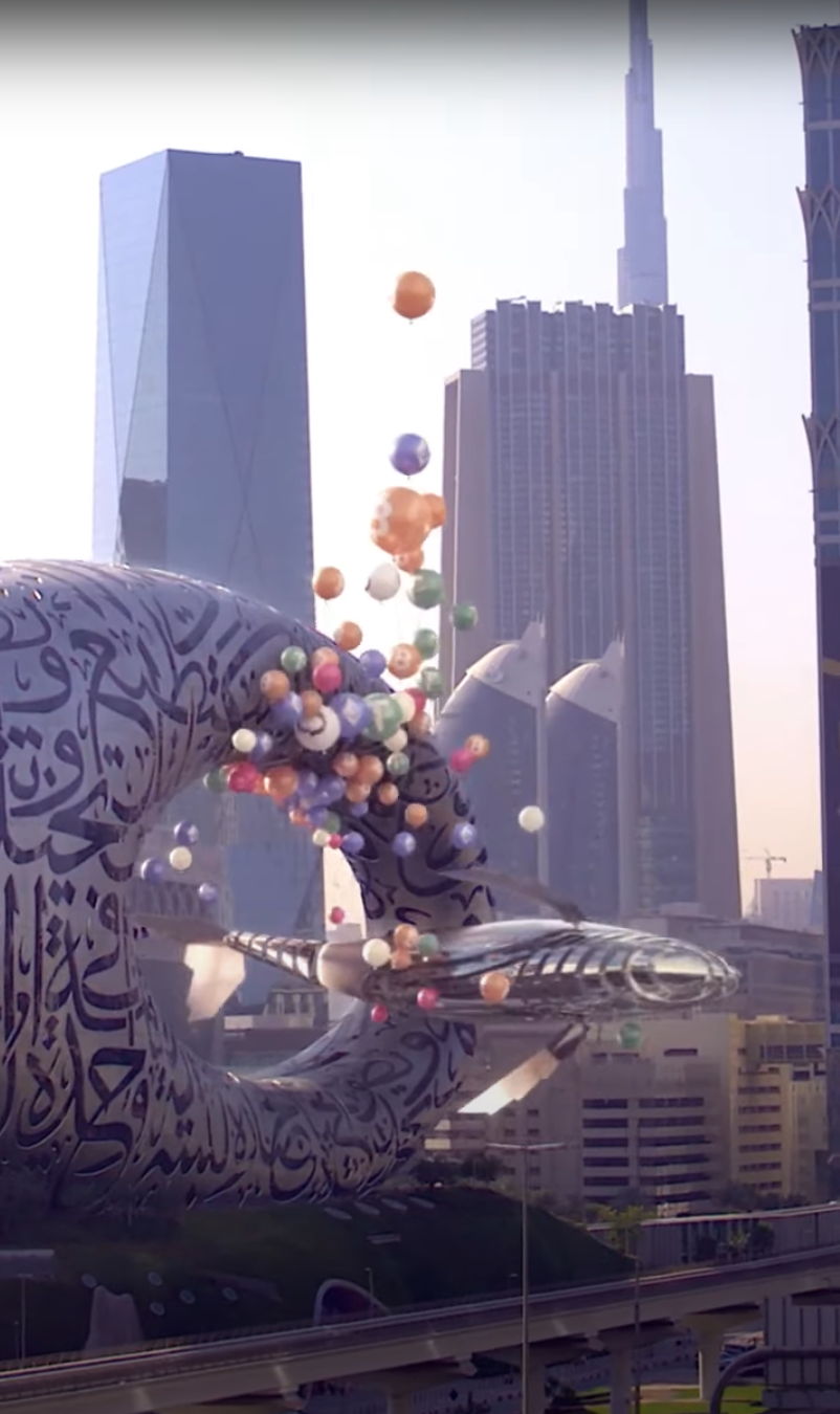 Metal whale cutting a symbolic ribbon at Museum of the Future in Dubai.