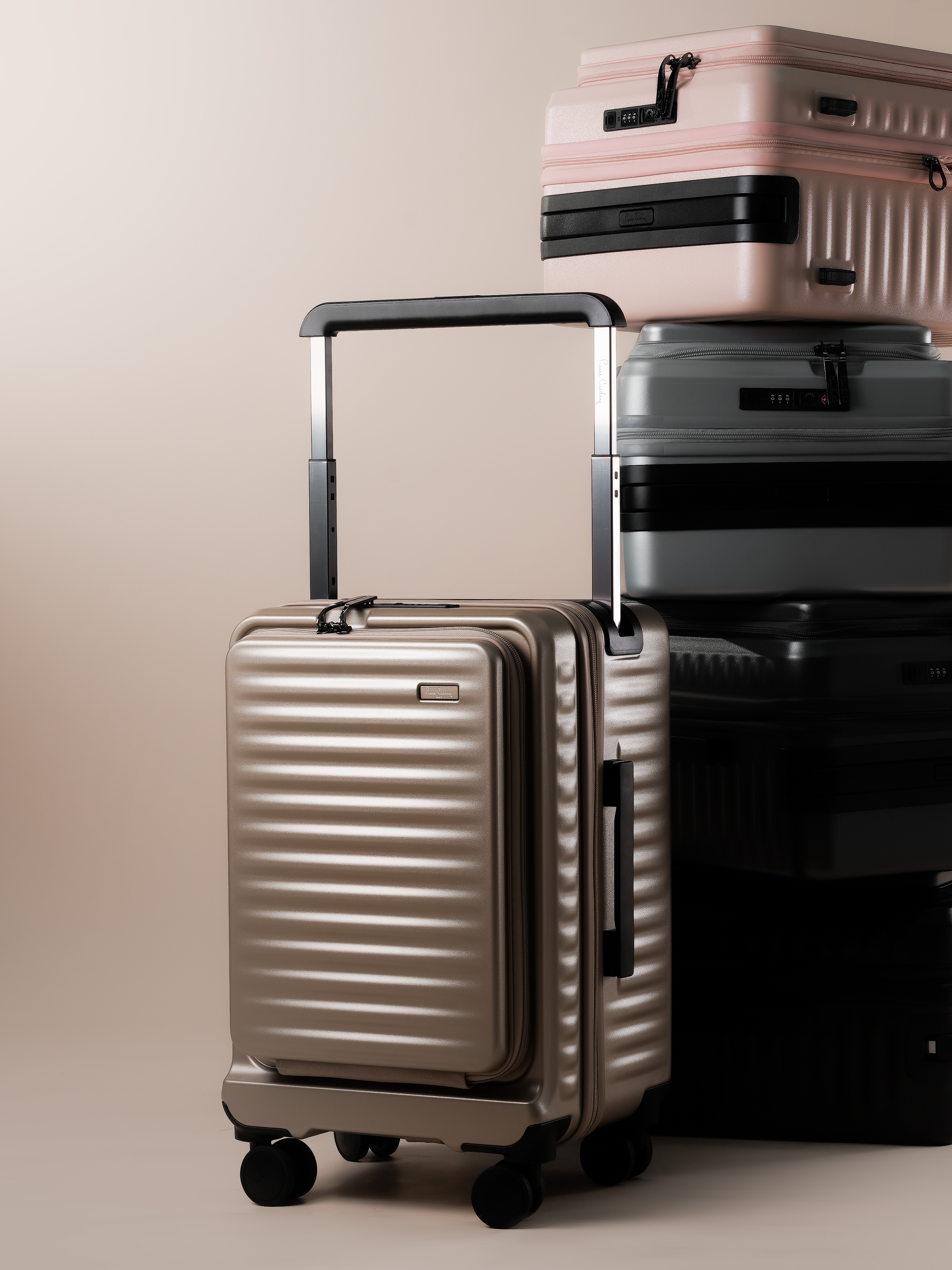 Stacked Pierre Cardin Osaka luggage products.