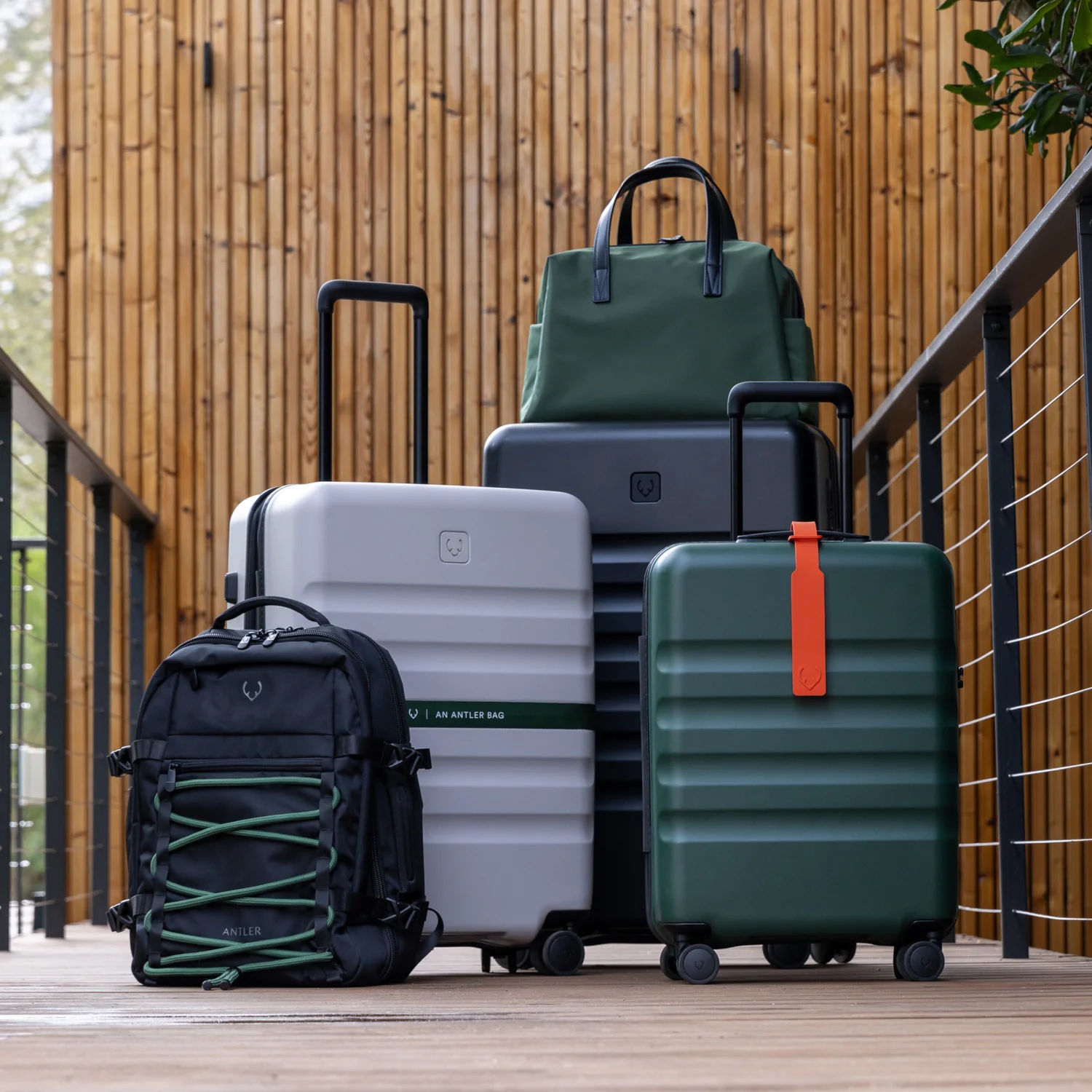 Antler luggage and bags arranged as a coordinated travel set.