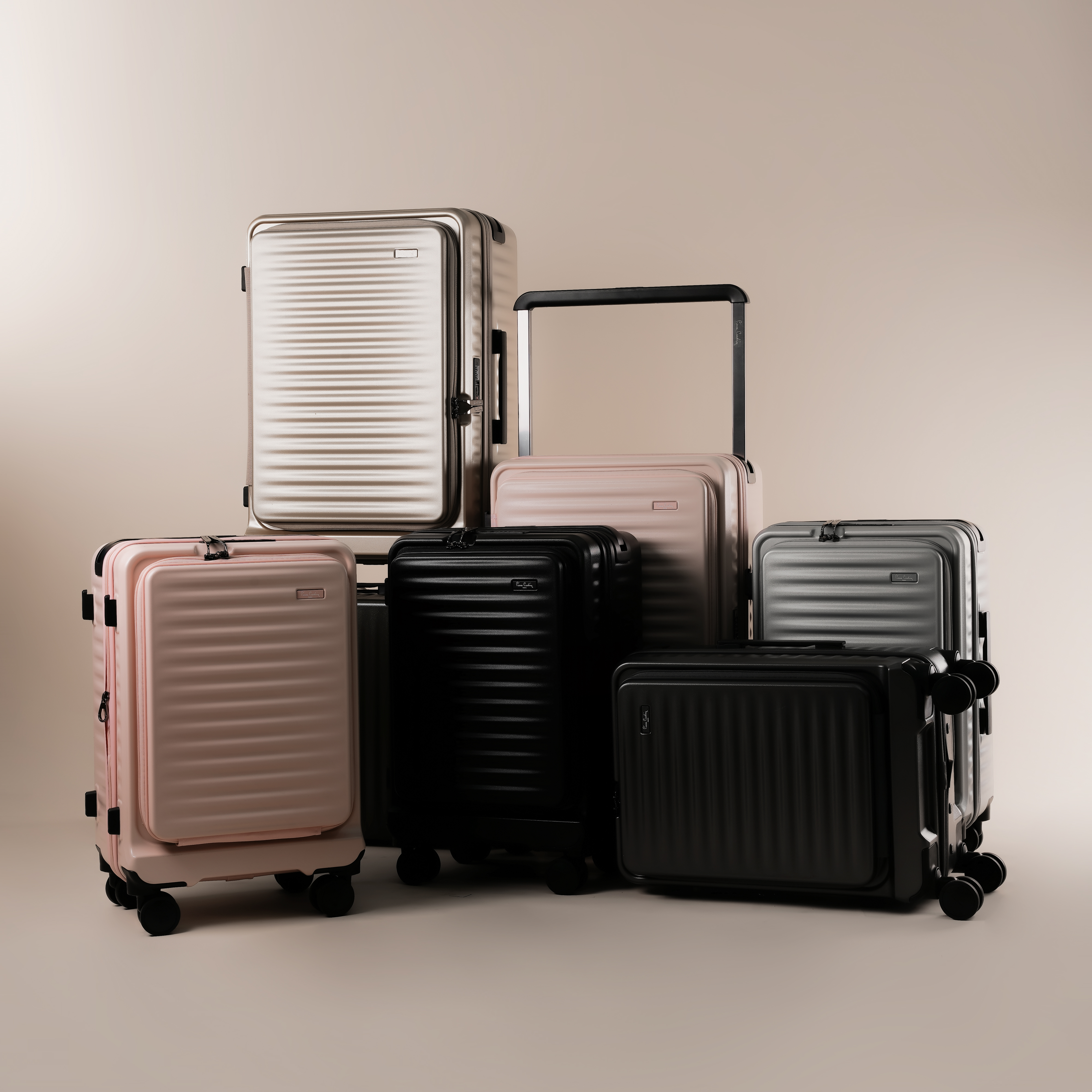 Pierre Cardin Osaka luggage range arranged in studio.