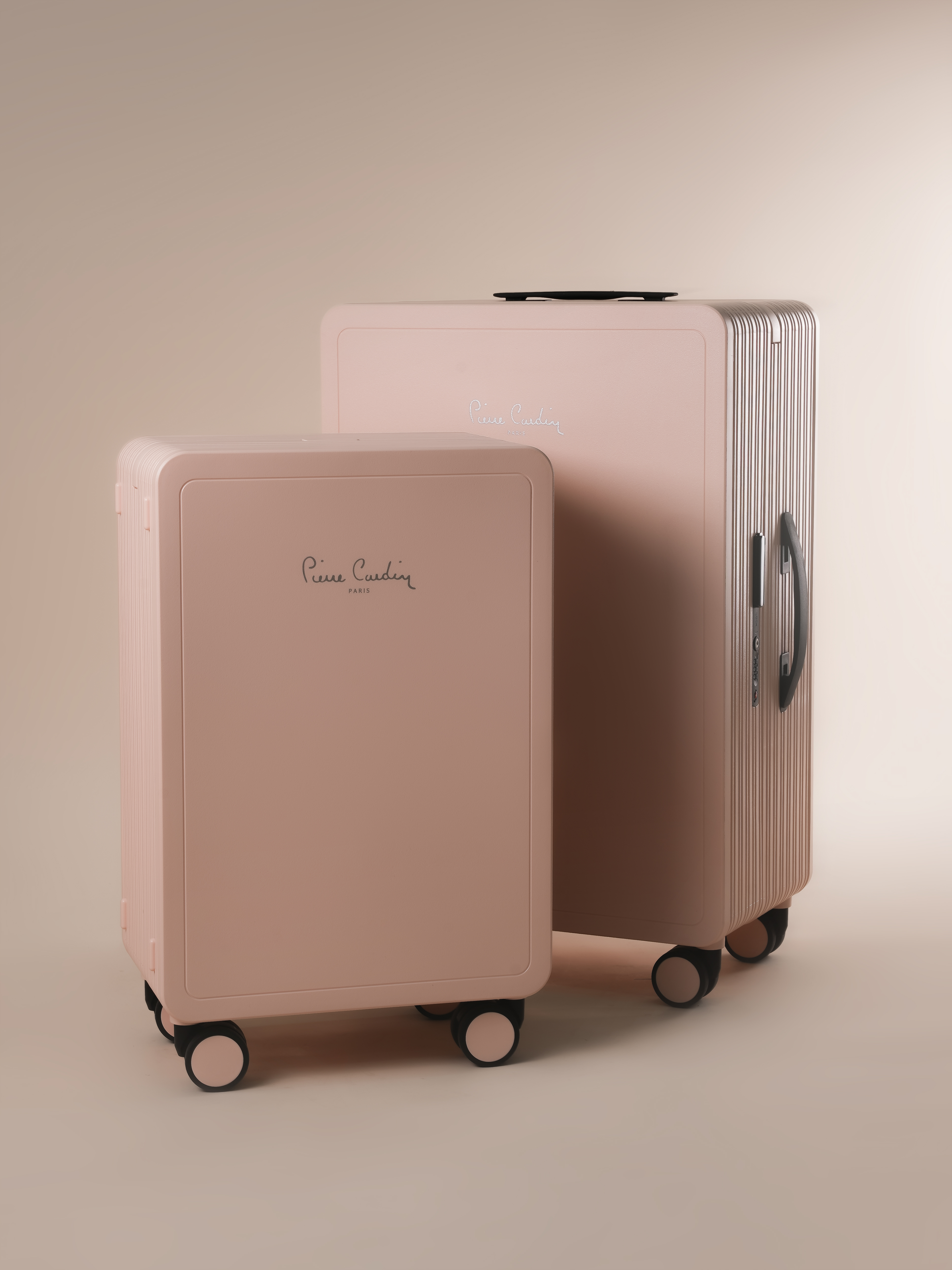 Rose Pierre Cardin Osaka luggage set in studio.