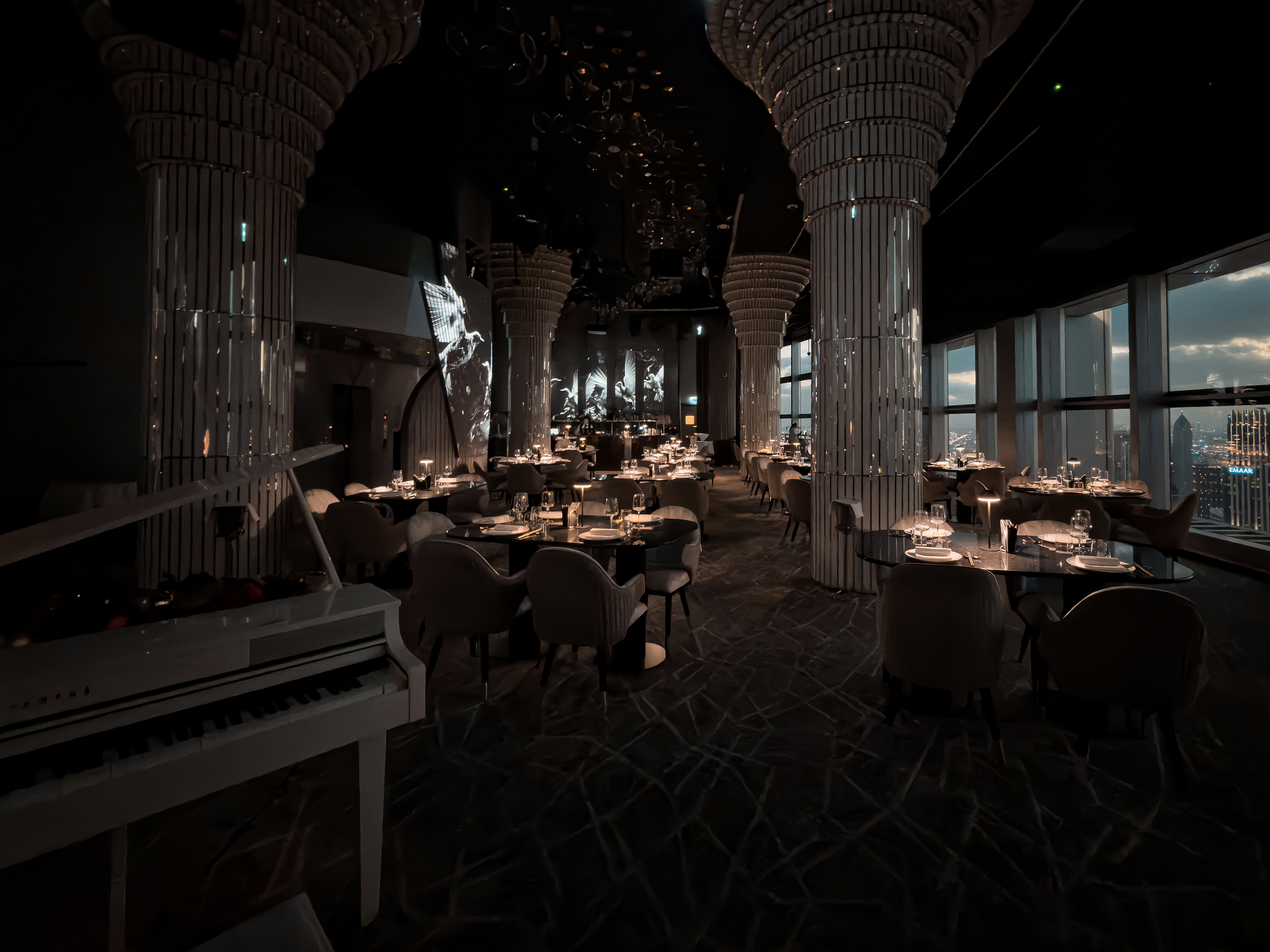 Piano and dining area at BIRDS Dubai.