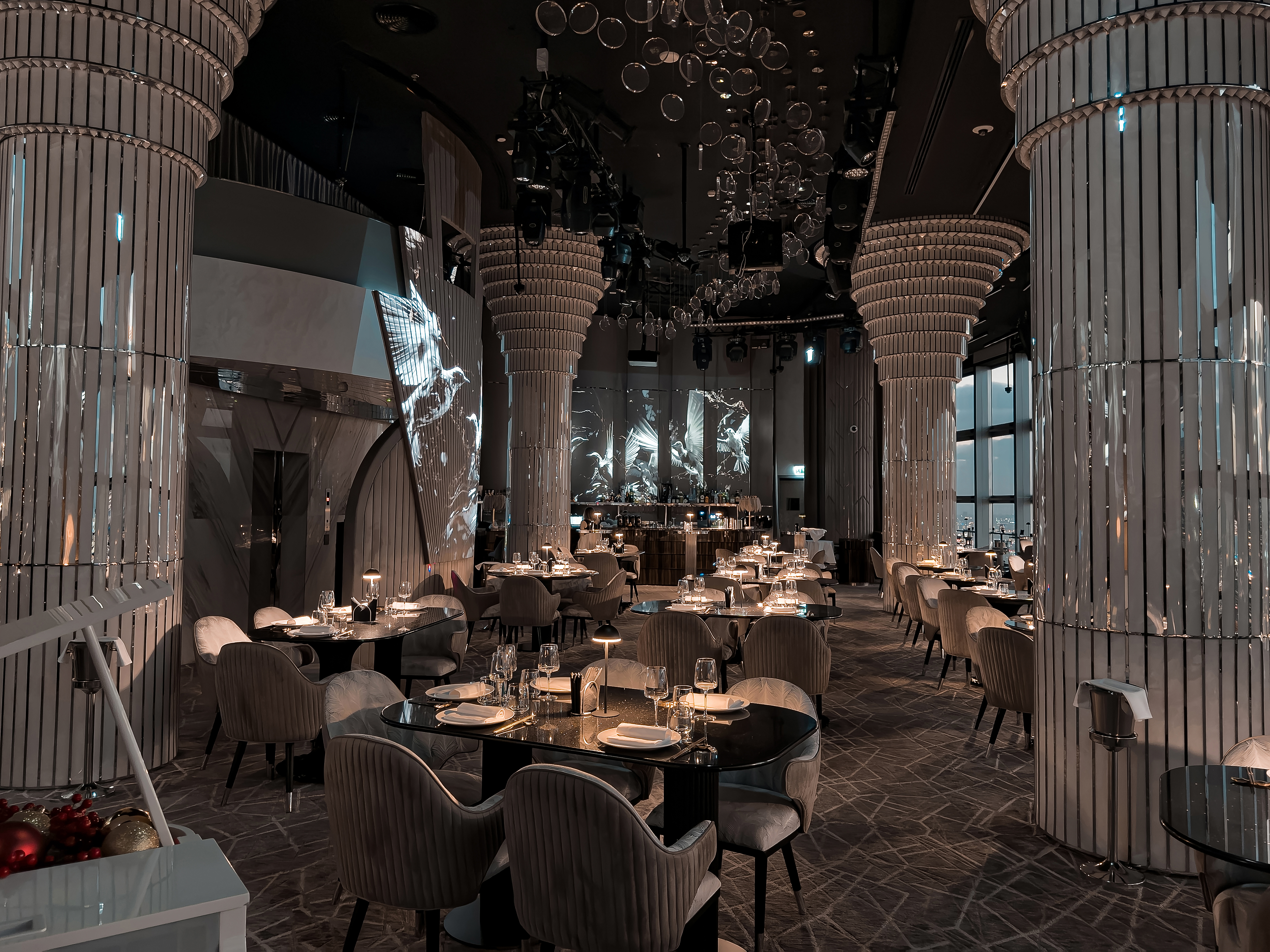 Theatrical dining interior at BIRDS Dubai.