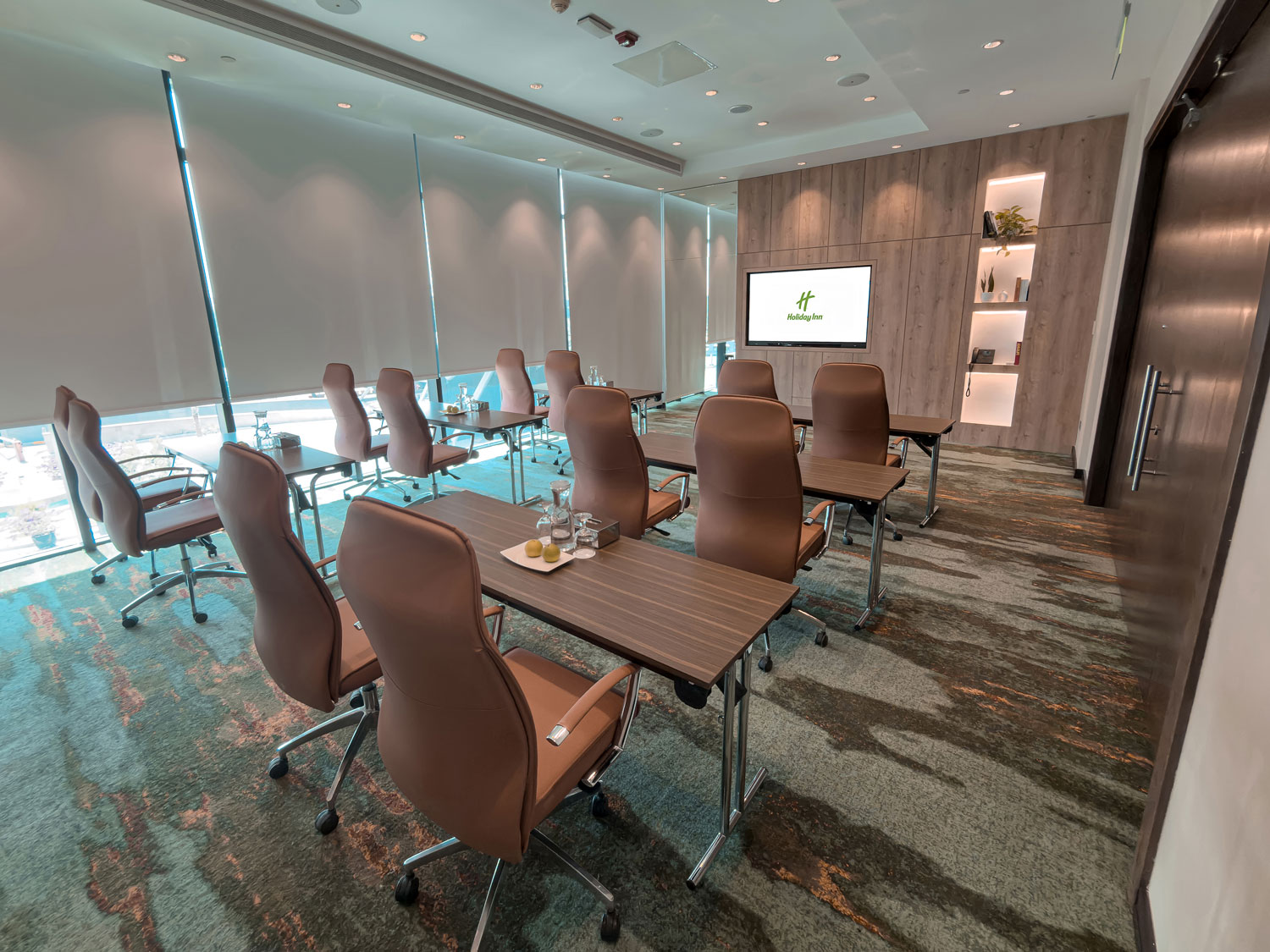 Holiday Inn Abu Dhabi meeting room arranged for a corporate session.