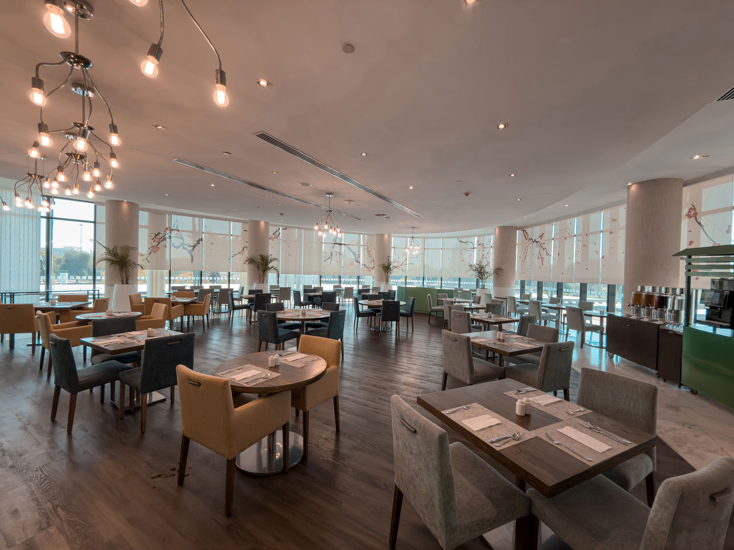 Restaurant dining area at Holiday Inn Abu Dhabi.