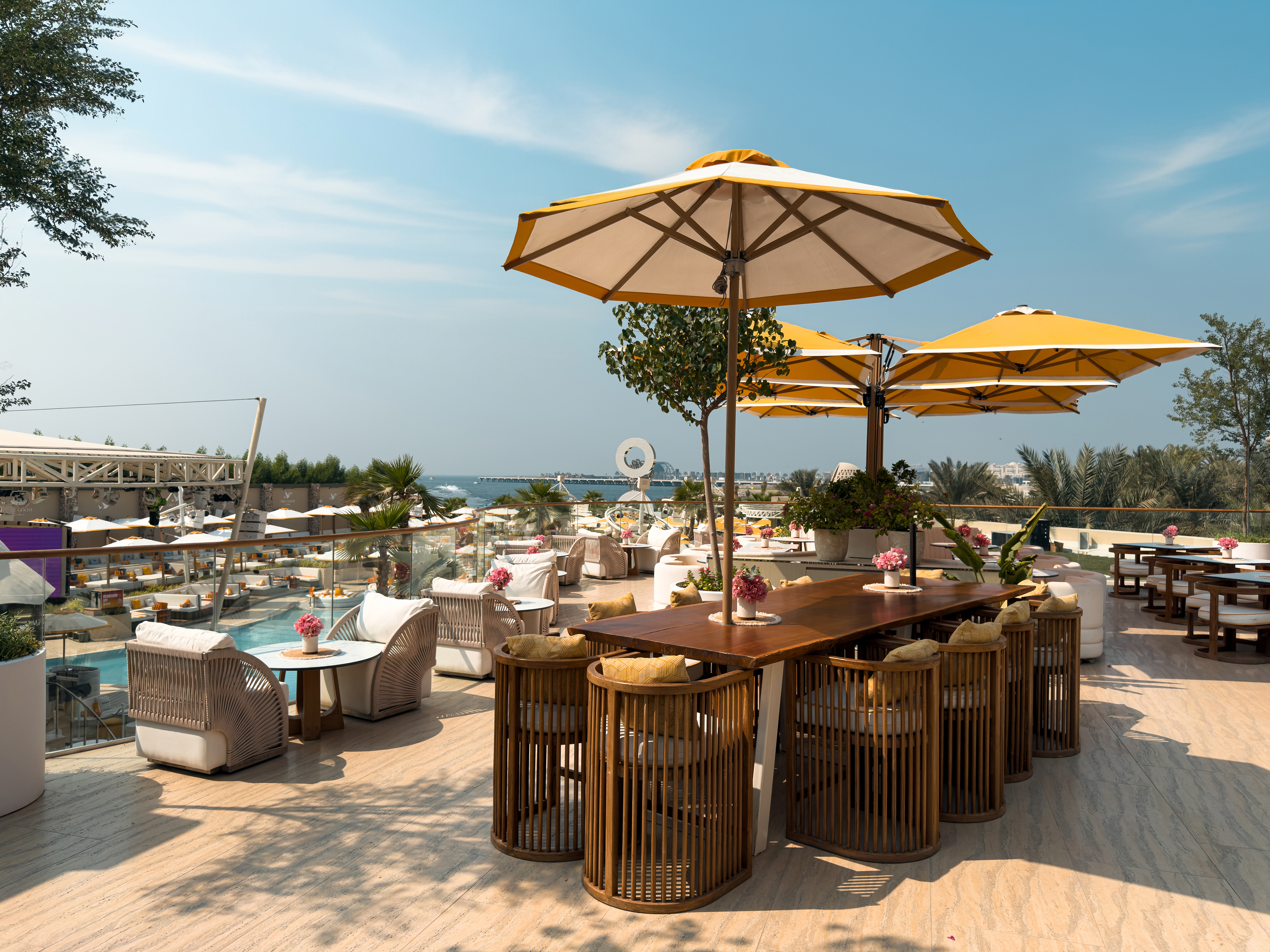 Dining deck and outdoor tables at O Beach Dubai.