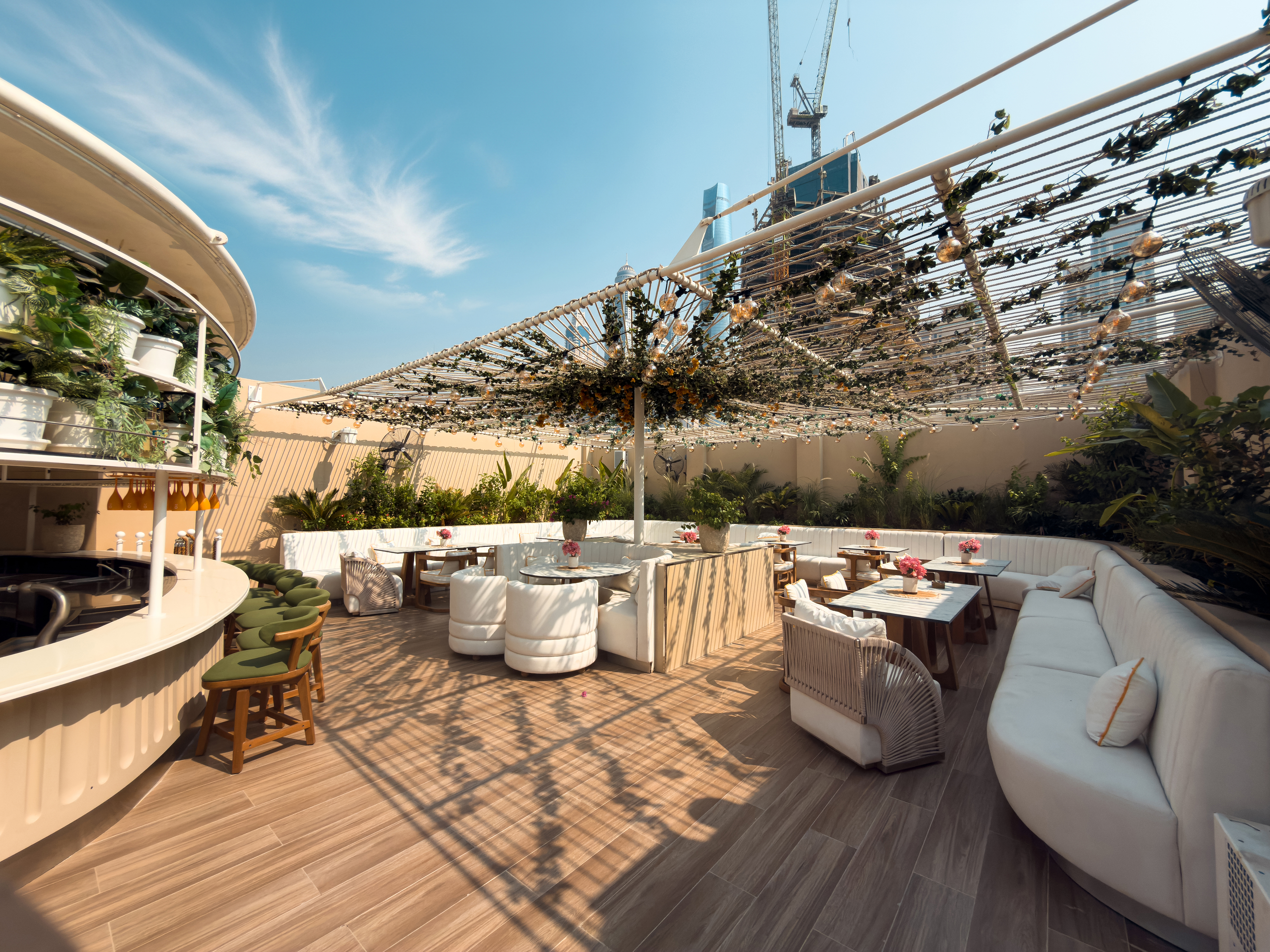 Private deck seating and umbrellas at O Beach Dubai.