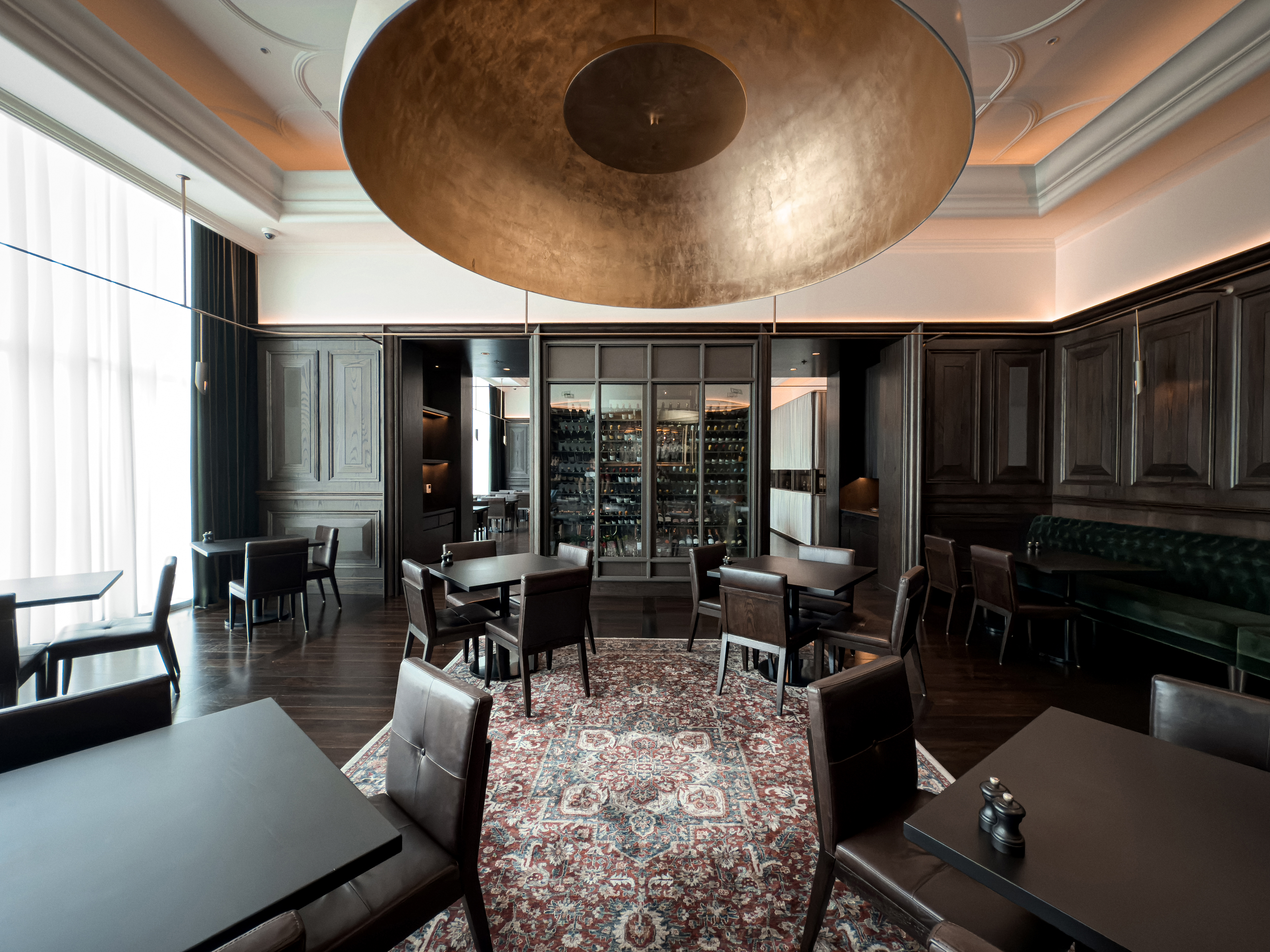 Private dining room with dark wood interior.