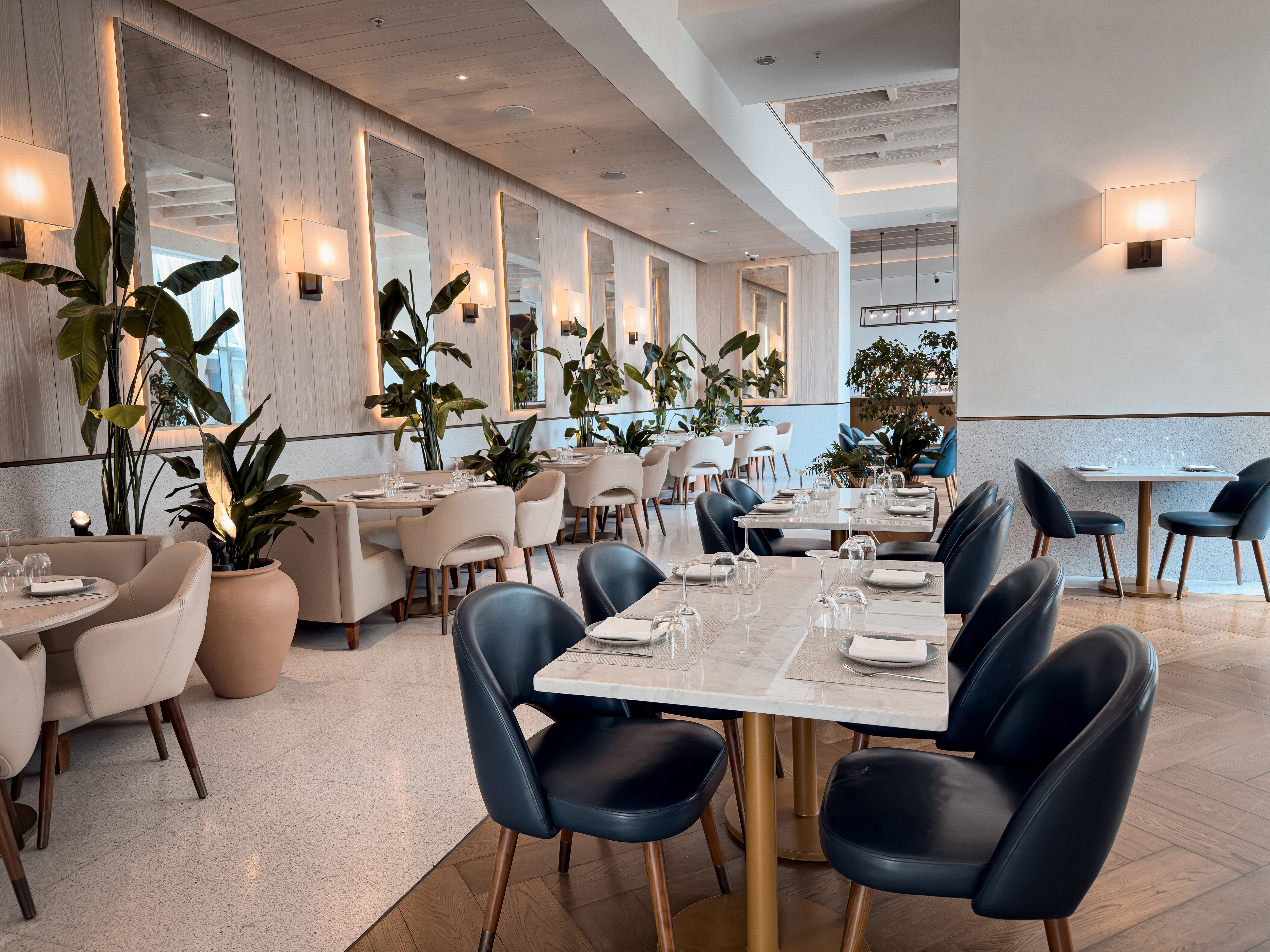 Elegant restaurant dining area at The Abu Dhabi EDITION Hotel.