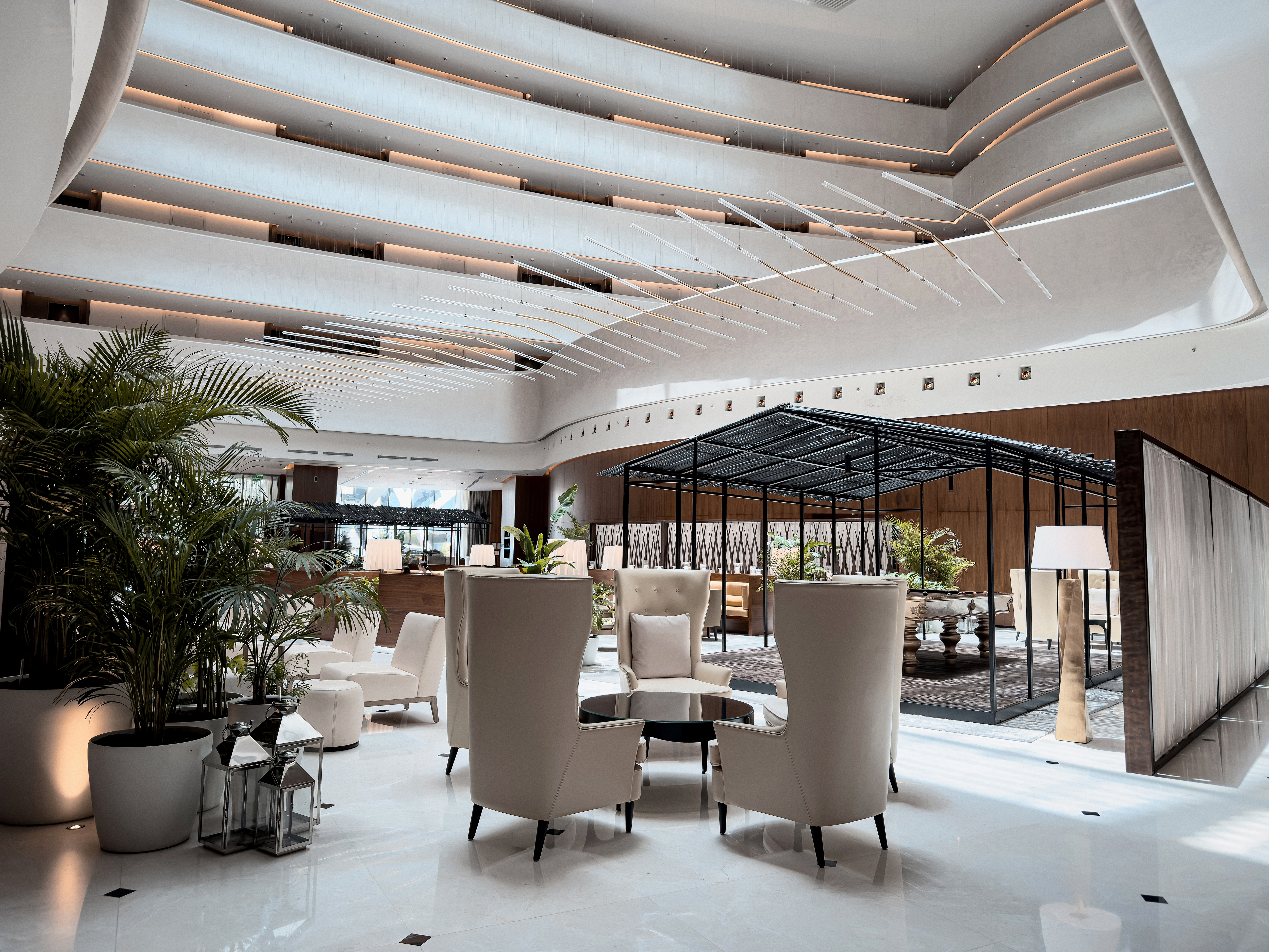Terrace at The Abu Dhabi EDITION Hotel overlooking the waterfront.